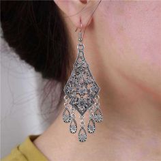 Aneneiceera Vintage Filigree Tassel Earrings Silver Fringe Chandelier Earrings Tribal Hollow Out Filigree Earrings Long Chain Earrings Gypsy Statement Earrings Jewelry For Women And Teen Girls Fast Shipping Brand New In Box, Still Factory Sealed Click "Buy Now" Button To Place Order Secure, Verified Payments Via Facebook And Paypal Delivery: Estimated 3-5 Days Returns Accepted: Free 30-Day Returns. *Tribal Filigree Chandelier Drop Earrings Made Of High-Quality Alloy,Very Durable For Daily Wear. Tassel Drop Earrings For Wedding, Vintage Silver Chandelier Earrings, Dangle Crystal Alloy Earrings, Vintage Pierced Chandelier Earrings, Metal Tassel Earrings For Wedding, Bohemian Alloy Earrings For Weddings, Metal Tassel Earrings As Gift, Bohemian Chandelier Earrings With Filigree For Parties, Silver Dangling Charms Earrings For Festival