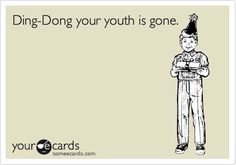 a man with a party hat on standing in front of a sign that says, ding - dong your youth is gone