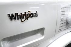 the whirlpool appliance is white and has black lettering on it