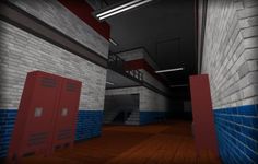 an empty room with two red lockers in the center and stairs leading up to the second floor