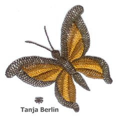 a yellow and brown butterfly on a white background with the words tanja berlin written below it