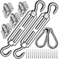 an assortment of metal hooks and clamps