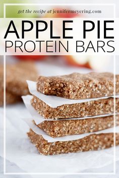 apple pie protein bars stacked on top of each other with the words, get the recipe at