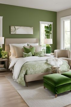 a bedroom with green walls and white bedding