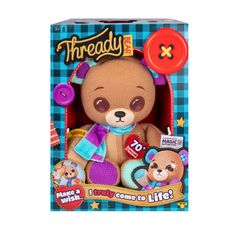 a teddy bear in a box with buttons on it