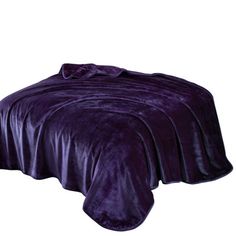 a bed with purple bedspread and pillows on top of it, in front of a white background