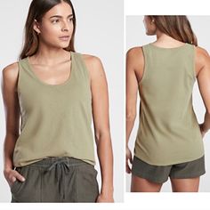 Nwt Athleta Organic Daily Tank Color: Shadow Olive Size: 1x New With Tags. No Marks, Odors, Flaws, Or Defects. Lightweight Organic Cotton Is Stretchy And Soft. The Scoop Neckline Flatters Your Form. Organic Cotton. Sustainable Easy Care Machine Wash And Dry. Skims Easily Over The Body. Body Length In 1x Plus: 25", Armpit To Armpit 21.5" Smoke/Fragrance/Dust-Free Home. Bundle Items To Receive Discounts And One Shipping Fee! Basic Scoop Neck Summer Activewear, Basic Scoop Neck Activewear For Summer, Casual Scoop Neck Tank Top For Sports, Relaxed Fit Solid Tank Top For Workout, Summer Tank Activewear, Summer Tank Activewear For Everyday, Summer Activewear With Scoop Neck, Casual Scoop Neck Tank Top For Gym, Casual Scoop Neck Gym Tank Top