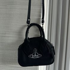 Black. Like New Condition. Designer Black Satchel With Mobile Phone Bag, Designer Black Satchel With Adjustable Handle, Vivienne Westwood 90s, Vivienne Westwood Purse, Vivienne Westwood Bags, Cross Body Purse, Mini Crossbody Bag, Mini Crossbody, Vivienne Westwood