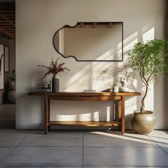 a wooden table sitting next to a potted plant