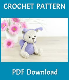 a crochet pattern for a teddy bear sitting in front of some pink flowers