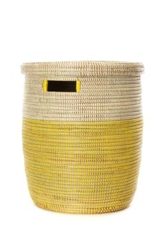 a yellow and white basket with a black handle on the bottom, sitting against a white background