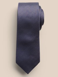 Spun luxury, this incredibly dapper tie is crafted from silk twill for a sophisticated feel on a unique silhouette.  Hand-pressed and shaped for a clean finish.  Measures 3" at widest point.  Length: 58" (147cm) Silk Twill, Banana Republic, Silk, Purple