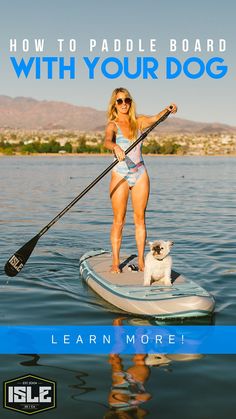 a woman standing on a paddle board with her dog in the water and text how to paddleboard with your dog learn more