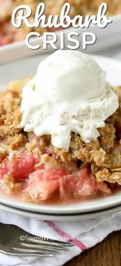 a close up of a plate of food with ice cream on top and the words rhubarb crisp above it