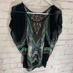 In Great Condition. Sheer Like Material. Size M. Black Printed Summer Tops, Black V-neck Printed Blouse, Black Bohemian Printed Blouse, Black Spring Vacation Blouse, Black V-neck Summer Blouse, Black Blouse For Spring Vacation, Black Printed V-neck Top, Casual Black Flowy Blouse, Black Flowy Summer Blouse