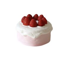 there is a small cake with strawberries on top