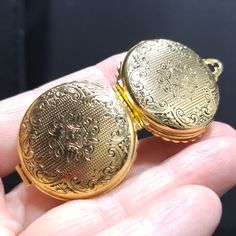 *Description: This is an unsigned Coro locket with a patent by Edwin S. Donle from the 1950s. The locket has four panels which include the front and back. The clasp is under the bail and when opened the two inner sections fit together like a clam shell. Each side could hold a photo and it is possible that two additional photos could be added. The design allows for many possibilities. I tested the surface for 10K gold and it tested as gold filled or gold plated. It is only marked with the patent Gold Antique Finish Locket Necklace For Keepsake, Vintage Oval Pendant Locket Necklace For Keepsake, Vintage Yellow Gold Locket Necklace For Keepsake, Vintage Yellow Gold Hallmarked Locket Necklace, Vintage Gold-tone Locket Necklaces, Unique Locket, Formal Earrings, Vintage Christmas Gifts, Book Pieces