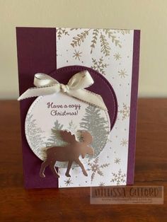 a christmas card with a deer on it