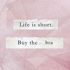 the words life is short, buy the dress on pink and white background with black border