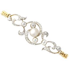 A stunning, fine and impressive antique Victorian natural saltwater pearl and 2.72 carat diamond, 15 karat yellow gold and silver set bracelet; part of our antique jewelry and estate jewelry collections. This stunning, fine and impressive antique Victorian bracelet has been crafted in 15k yellow gold with a silver setting. The pierced and millegrain decorated, scrolling design is ornamented with a fine central 7.6mm (approx.) natural saltwater pearl. The asymmetrical scrolling anterior face of t Top Jewelry Trends, Victorian Bracelet, Set Bracelet, Gold Link Bracelet, Saltwater Pearls, Antique Bracelets, Natural Pearl, Yellow Gold Bracelet, Antique Diamond