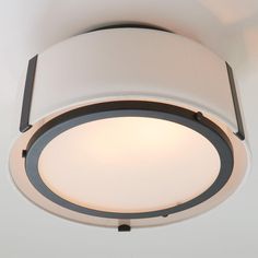 a close up of a light fixture on a ceiling