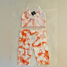 Nwt. Charlotte Russe 2-Piece Biker Shorts With Matching Bralette. Size L. Adjustable Straps. Orange And White. Bralette P2p - 14” Shorts Waist - 14” Inseam - 8” Length - 18” Spring Stretch Short Set, Trendy Spring Beach Activewear, Stretch Vacation Sets With Shorts, Trendy Beach Activewear For Spring, White Beachwear Sets For Spring, Stretch Short Sets For Vacation, Sleeveless Orange Activewear For Summer, Summer Athleisure Fitted Biker Shorts, Fitted Athleisure Biker Shorts For Summer