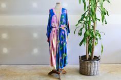 Vintage Collectors Rare GW Designs Tie Dye Rainbow Love Heart Kimono Dressing Night Gown. The colours are amazing, pastel, blue, pinks, purples with a pattern of two people on the back with a love heart and a star. A really special piece. Cotton One size fits all. In excellent vintage condition. Blue Spring Robe For Loungewear, Blue Summer Kimono For Home, Summer Blue Kimono For Home, Blue Summer Robe For Daywear, Blue Robe For Spring Daywear, Blue Robe For Summer Daywear, Multicolor Long Summer Sleepwear, Blue Spring Robe For Home, Blue Summer Home Robe