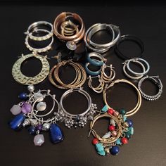 16 pcs grab bag hoop earrings lot Vintage 80s jewelry lot with Gold tone, silver tone metal jewelry lot Wearable hoop earrings, dangle charm earrings  good condition Mystery jewelry bundle gift for women, mother, girlfriend.  Same day shipping so your can get your vintage costume jewelry lot in no time.  Style - 80s jewelry lot, jewelry lot wearable, gold necklace bundle,  Metal - gold plated, silver plated  Condition - good vintage  This jewelry mystery scoop will be shipped in one zip log bag Mystery Scoop, Mystery Jewelry, Mixed Jewelry, 80s Jewelry, Hand Earrings, Grab Bag, Dangle Charms, Vintage Costume Jewelry, Earrings Dangle