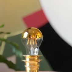 a light bulb sitting on top of a table