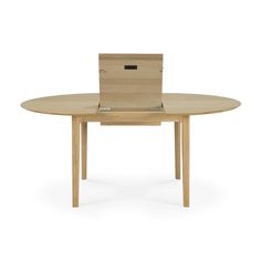 a wooden table with an open box on it's back end and two legs