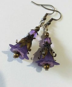 Purple Victorian bronze flower earrings lavender flower set necklace earrings Purple flower earrings Boho bronze earrings gift Gorgeous Victorian style jewelry set necklace and earrings . Bohemian necklace and earrings . Beautiful Set of bronze-tone Antique style lavender purple plastic flowers  and beautiful ornamented caps necklace and earrings. Bronze Victorian style necklace and earrings. Boho necklace. Bohemian necklace and earrings. Romantic necklace and earrings. Royal style jewelry set. Bohemian Metal Jewelry With Flower Charm, Purple Flower Shaped Jewelry Gift, Bronze Czech Glass Dangle Jewelry, Purple Flower Charm Jewelry, Bohemian Dangle Jewelry With Flower Charm, Purple Flower Pendant Jewelry With Charm, Purple Jewelry With Flower Charm And Pendant, Purple Jewelry With Flower Pendant And Charm, Handmade Purple Copper Jewelry