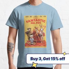 a man wearing a blue t - shirt with the title fantastic mr fox on it