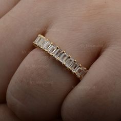 Real Baguette Diamond Full Eternity Band Ring Solid 14K Yellow Gold Fashion Fine Party Wear Jewelry Gift For Her * SKU: SR01032 * Made to Order * Gold Purity: 14K Solid Yellow Gold (stamped) * Custom Gold Color: Rose Gold, Yellow Gold, White Gold * Custom Gold Purity: 9K/14K/18K (Charges Apply) * Baguette Diamond Weight: 2.10 ct. Product Measurement:- Ring Size: 2 to 10 (All sizes available) ✦ Size can be customized as per your request, please mention the required size in buyer notes (Charges ma Gift Emerald Cut Eternity Band With Baguette Diamonds, Emerald Cut Eternity Band With Baguette Diamonds, Gift Emerald Cut Baguette Diamond Eternity Band, Baguette Cut Diamonds Eternity Band As Gift, Baguette Diamonds Eternity Band As Gift, Baguette Diamond Eternity Band Gift, Gold Eternity Band With Baguette Diamonds For Anniversary, White Baguette Cut Eternity Band As Gift, Gold Eternity Band With Baguette Cut For Promise Ring