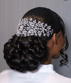 a woman wearing a bridal hair comb