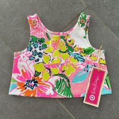 Lilly Pulitzer For Target Girls' Tank/Crop Top - Noisy Posey Print Sold Out In Stores And Online. Brand New With Tags Comes From Pristine, Smoke/Pet Free Home. Feeling Fabulous Just Got A Little Easier With The Lilly Pulitzer For Target Girls' Tank Top In Nosie Posey. This Fun Swing Top Is Sweetly Chic On So Many Levels, From Its Bold Pastel Floral Pattern To The Cute Gold Tab Buttons At The Shoulders. In Textured Pont Knit With A Hint Of Stretch And Slightly Cropped Shape For A Retro Mod Vibe, Playful Printed Sleeveless Top, Playful Sleeveless Printed Top, Yellow Tops For Spring Playwear, Yellow Spring Tops For Playwear, Playful Tank Top For Spring Vacation, Playful Pink Tops For Vacation, Yellow Playful Tops For Playtime, Playful Yellow Tops For Playtime, Multicolor Sleeveless Tops For Playtime