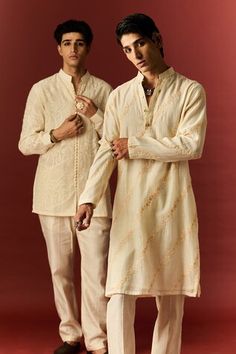 Ivory jacket style short kurta with applique detailing and pearl buttons. Paired with a matching plain pant. - Aza Fashions Traditional Bandhgala With Gota Work For Spring, Traditional Spring Bandhgala With Gota Work, Spring Wedding Sherwani With Gota Work, Bohemian Embroidered Jamawar Kurta, Transitional Beige Kurta With Resham Embroidery, Ivory Kurta For Men, Semi-stitched Beige Kurta With Resham Embroidery, Mens Embroidered Kurta, Men Kurta