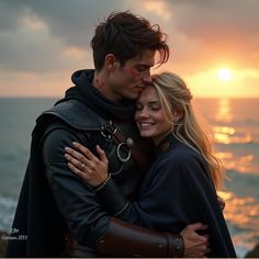 a man and woman embracing each other on the beach at sunset with the ocean in the background