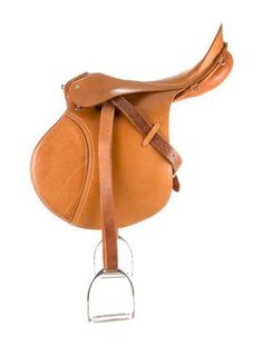 a saddle on a metal stand with a white background