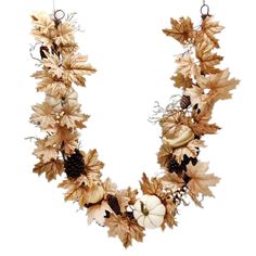 a wreath made out of leaves, acorns and pine cones on a white background