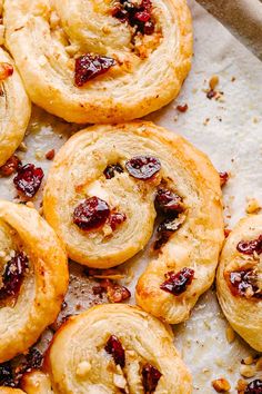 cranberry crescent pastries on a baking sheet