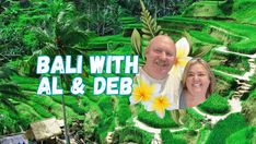 a man and woman standing in front of a lush green rice field with the words bali with al & deb