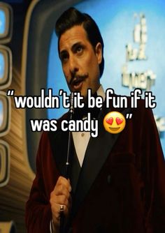 a man in a tuxedo holding a microphone with the words wouldn't it be fun if it was candy