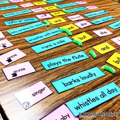 a wooden table topped with lots of different colored sticky notes on it's sides