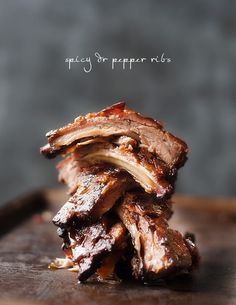 some ribs are stacked on top of each other and ready to be cut into pieces