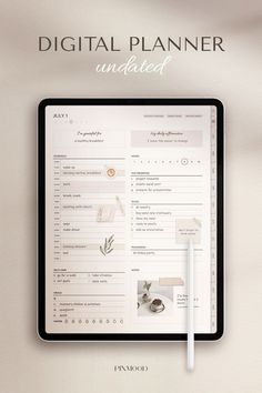 a digital planner is attached to a tablet with a pen and paper on the cover