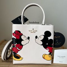 100% Authentic Brand New With Tags Disney Collection Kg591 Other Disney X Kate Spade New York Mini Tote Parchment And Gold Hardware 7" L X 7" H X 3" D Handles With 3” Drop Long Shoulder Strap Included Disney Handbags Kate Spade New York, Cheap Pink Mickey Mouse Bags, Disney Minnie Mouse White Bag, White Minnie Mouse Bag For Daily Use, White Mickey Mouse Bag For Disney Fan Events, Disney White Bags For Disney Trips, Cute White Mickey Mouse Bags, White Mickey Mouse Bag For Daily Use, White Mickey Mouse Bags For Daily Use