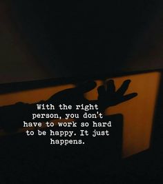 someone is holding their hand up in the dark, saying with the right person you don't have to work so hard to be happy it just happens