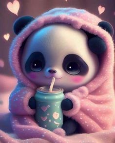 a panda bear with a drink in it's hand on top of a blanket