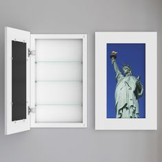 the statue of liberty is shown in an open cabinet