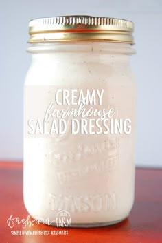 a jar filled with creamy homemade salad dressing